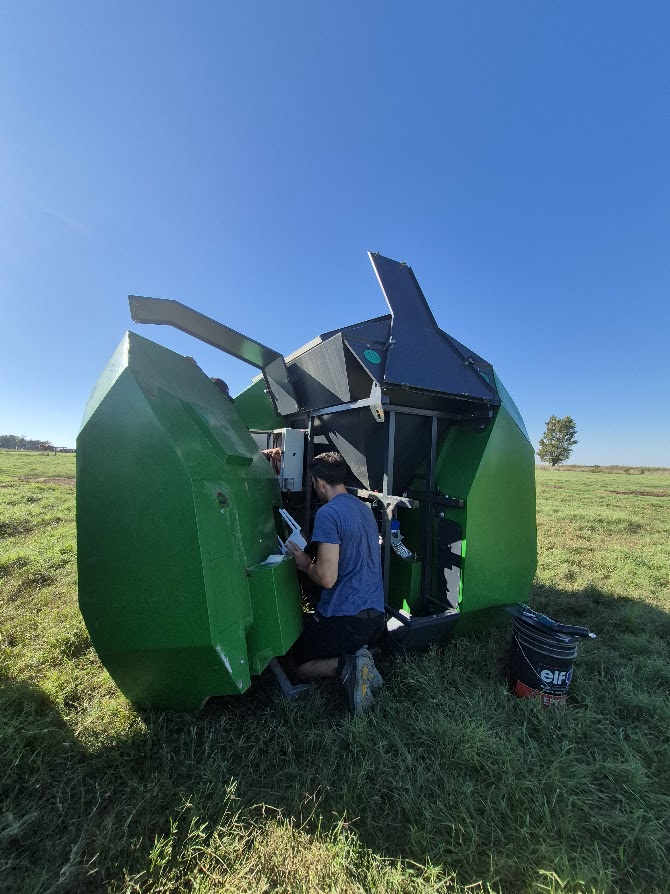 Vetkiosk device opened in the field showing modular internal components being serviced